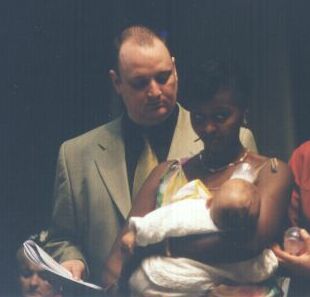 Axel-Gitego, ses parents et sa marraine